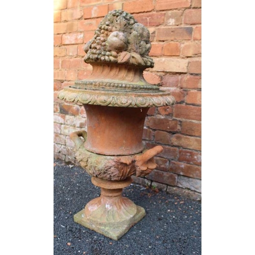 443 - A Classical design terracotta Camparna urn, fitted two handles, egg & dart rim on square base, fitte... 