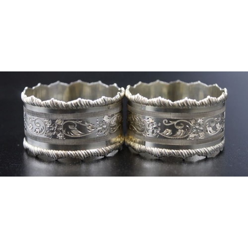 45 - A pair of silver floral engraved napkin rings, Sheffield 1905 combined weight 55g