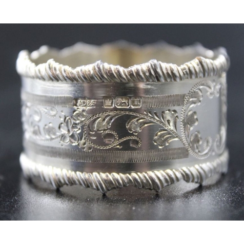 45 - A pair of silver floral engraved napkin rings, Sheffield 1905 combined weight 55g