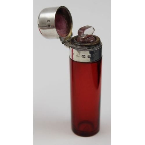 46 - Two Victorian ruby scent bottles with silver mounts, Birmingham1898-1900 tallest 7cm