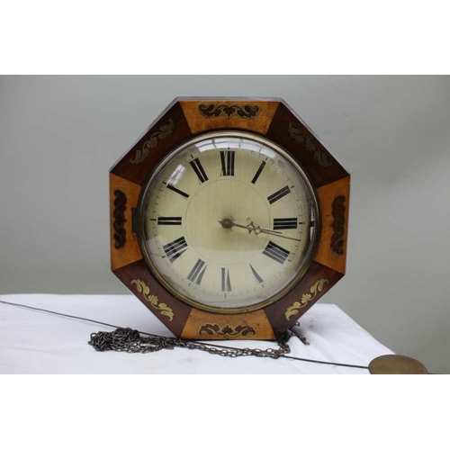 476 - A 19th century post clock, the octagonal frame with decorative brass inlay, the dial with Roman nume... 