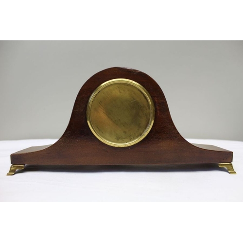 479 - An Edwardian mahogany hat clock, circular dial with Arabic numerals, 8cm in diameter, raised on bras... 