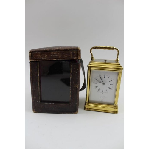 480 - A 19th century French brass repeater carriage clock, the gilt brass frame with five bevel glass pane... 