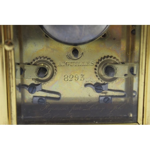 480 - A 19th century French brass repeater carriage clock, the gilt brass frame with five bevel glass pane... 