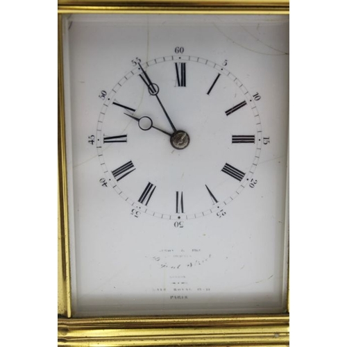 480 - A 19th century French brass repeater carriage clock, the gilt brass frame with five bevel glass pane... 