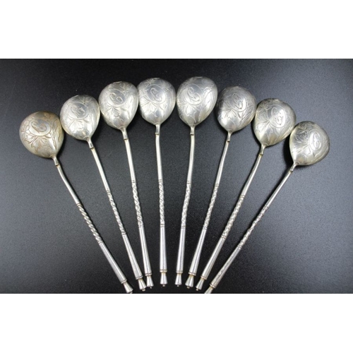 50 - A set of eight Russian silver tea stirrers, engraved bowls with monogram 