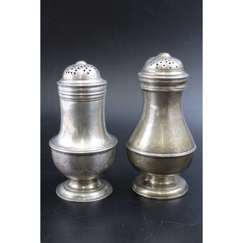 67 - A George II silver pepper of baluster form, London 1735, 9cm high, together one other Georgian silve... 