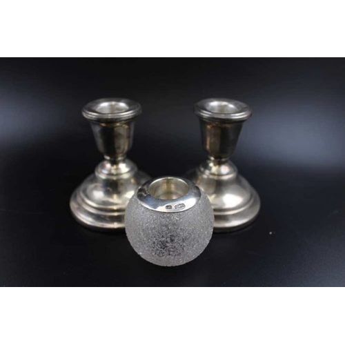 68 - Broadway & Co. A pair of silver candlesticks, with ring turned decoration, 17cm high, Birmingham 196... 