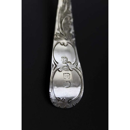 71 - A George III silver berry embossed sugar sifting ladle, gilded internal bowl, London 1800, 41g