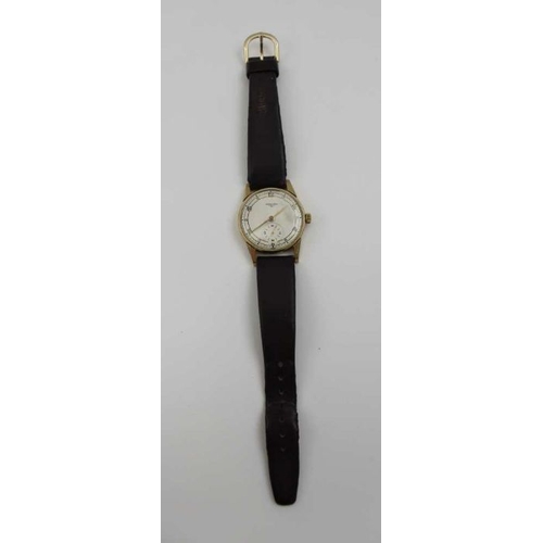 86 - A Longines gentleman's wristwatch with Arabic numerals and secondary dial, on brown leather strap