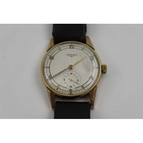 86 - A Longines gentleman's wristwatch with Arabic numerals and secondary dial, on brown leather strap