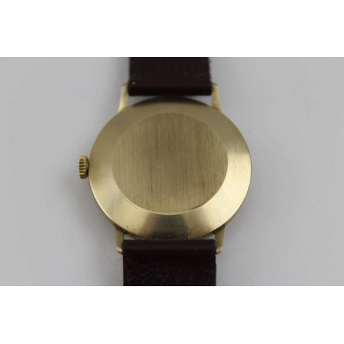 87 - A Marvin Revue gents 9ct gold cased wristwatch, baton dial, with date aperture, and leather strap