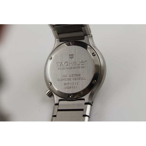 89 - A TAGHeuer stainless steel ladies wristwatch, with date aperture, numbered to the reverse WP13311, U... 