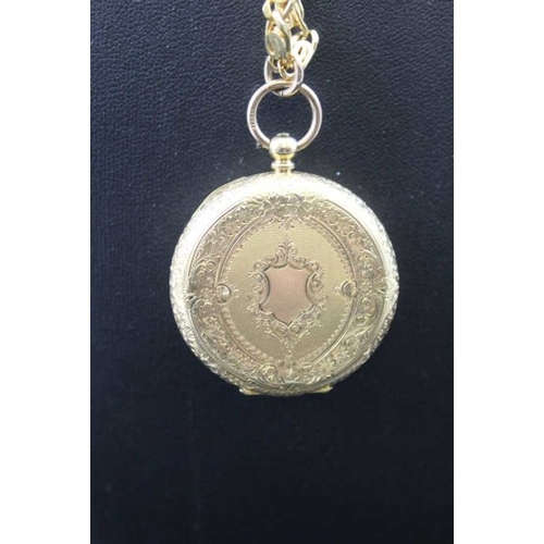 97 - An 18K engraved ladies pocket watch with roman numerals on a chain