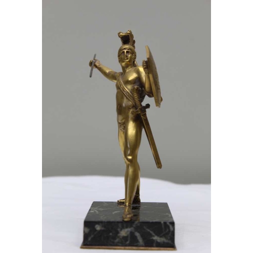 124 - A gilt bronze statue after the Antique, of a gladiator with shield and sword, on polished marble bas... 