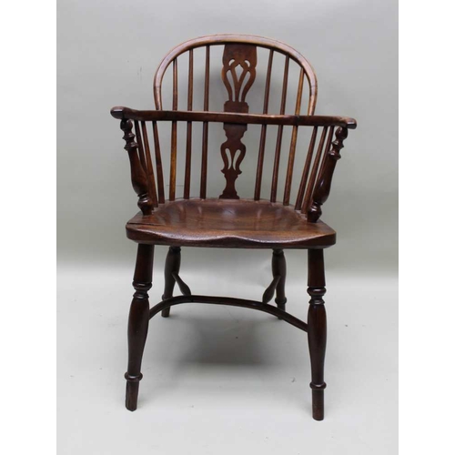 373 - A 19th century provincial open armchair, yew & elm, low hoop back with pierced splat, turned support... 