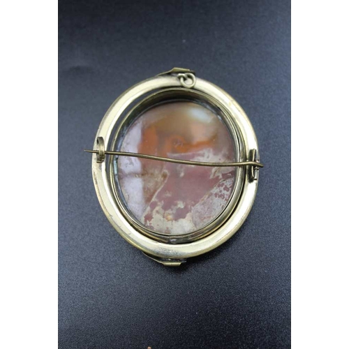 207 - A Victorian cameo brooch 6 x5 cm together with an oval Victorian broach with memento mori hair panel... 