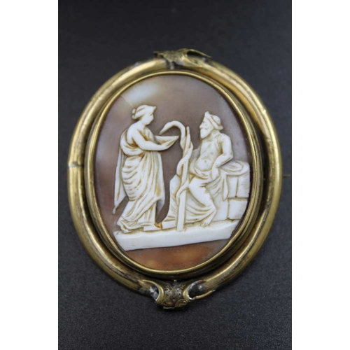 207 - A Victorian cameo brooch 6 x5 cm together with an oval Victorian broach with memento mori hair panel... 