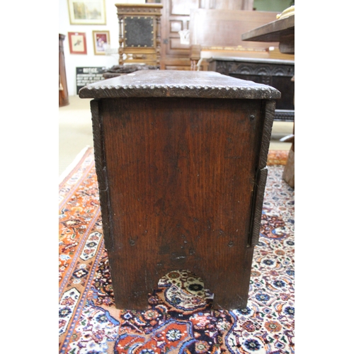 397 - An 18th century oak plank coffer, with hinged lid, 92cm wide