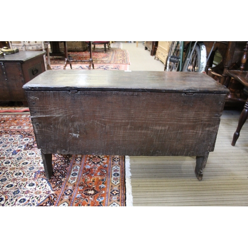 397 - An 18th century oak plank coffer, with hinged lid, 92cm wide