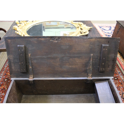 397 - An 18th century oak plank coffer, with hinged lid, 92cm wide