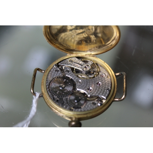 84 - An 18ct gold cased gentleman's wristwatch, with Rolex 15 jewel movement, the dial with Arabic numera... 