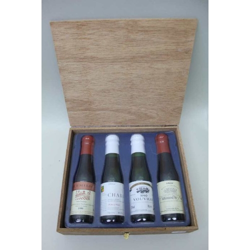 54 - Boxed collection of M & S French wine miniatures: 

Châteauneuf du Pape 1989, 1 x 10cl 

Vouvray 199... 