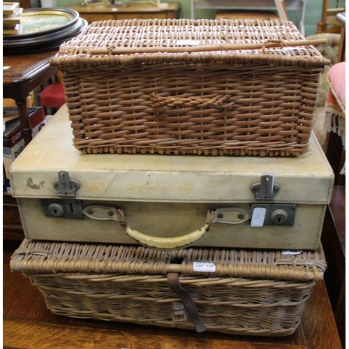 119 - Two wicker hampers together with a suitcase