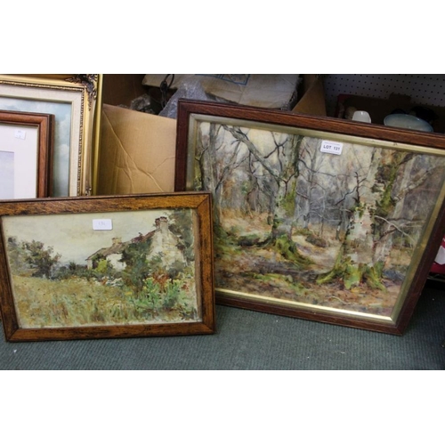 131 - Two framed watercolours, one of a Winter Wood the other a Cottage