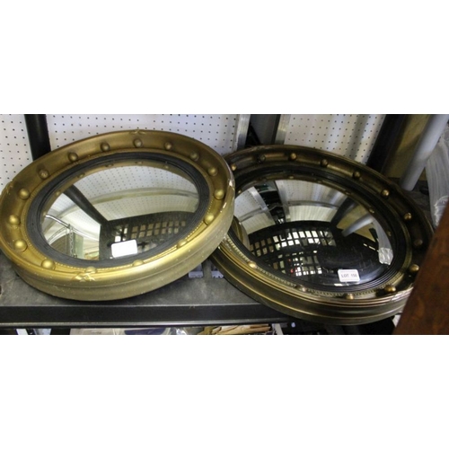 150 - Two gilt framed convex wall mirrors