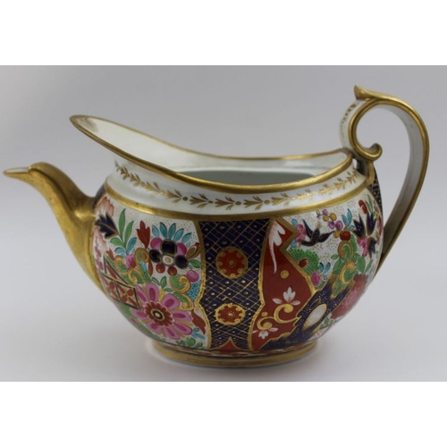 183 - An early 19th century porcelain teapot, with hand painted and gilded Japan decoration