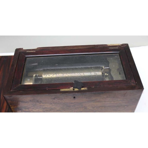 187 - A late 19th century rosewood cased cylinder musical box, clockwork mechanism, 17cm cylinder, the cas... 