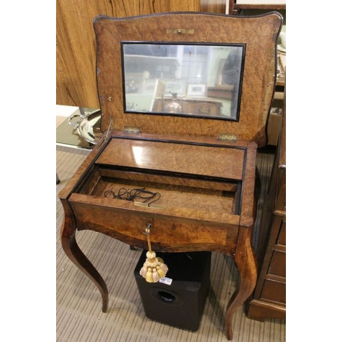 203 - A 19th century French walnut and rosewood vanity table with mirrored lift up lid, over single drawer... 