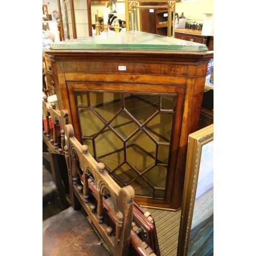 210 - A 19th century mahogany hanging corner cupboard, with fancy bar glaze single door, and glass shelved... 