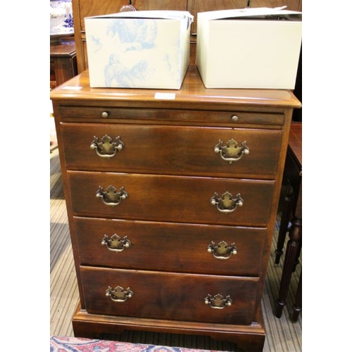 216 - A reproduction small sized four drawer chest, with brushing slide