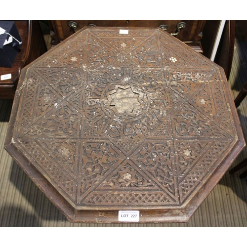 227 - An Inlaid morrish design octagonal table