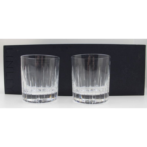 232 - Designed by David Linley, London, a pair of cut lead crystal whisky tumblers, engraved 