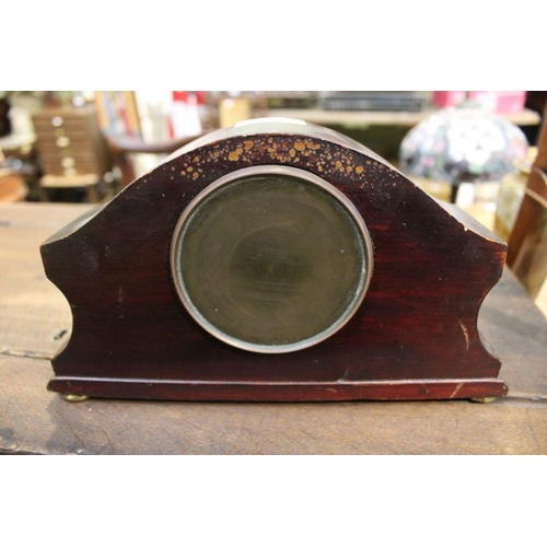 235 - A mahogany inlaid mantel clock