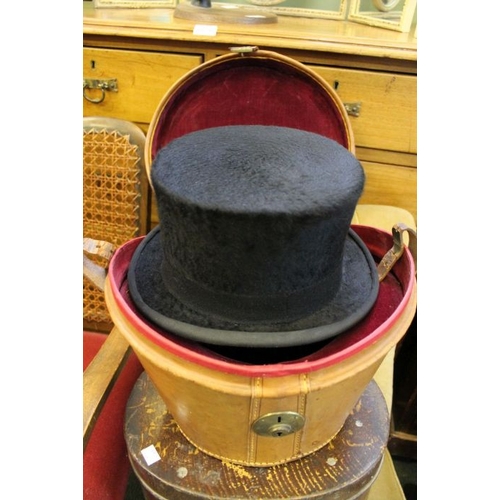 50 - A leather hat box containing S.Patey ltd silk top hat, together with a tin hat box