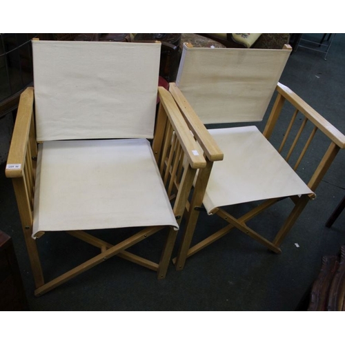 52 - A pair of folding directors chairs, white canvas backs & seats