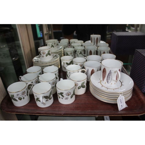 93 - A collection of five Susie Cooper bone china coffee cans with saucers, together with a collection of... 