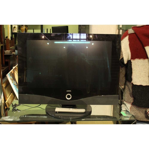 411 - A Loewe branded flat screen television with remote control