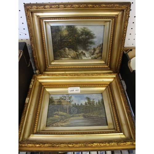 117 - A pair of oil on board riverscapes in fancy gilt frames.