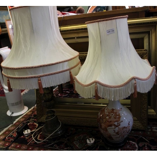 170 - An Oriental porcelain table lamp together with another in fancy cast metal.