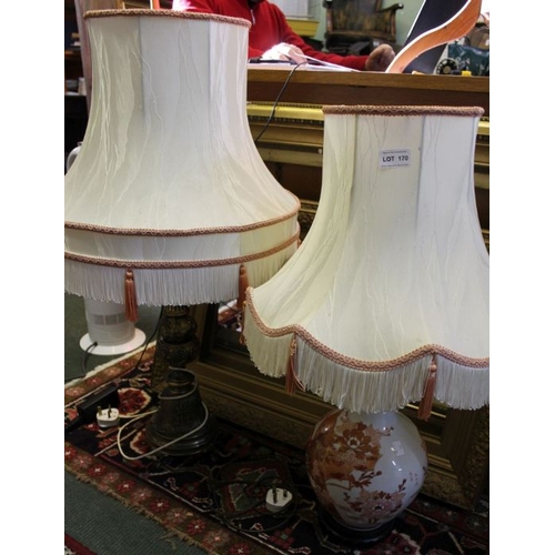 170 - An Oriental porcelain table lamp together with another in fancy cast metal.