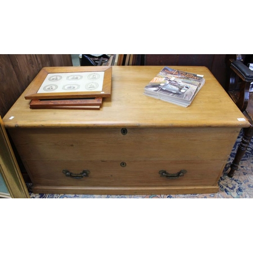 192 - An early 20th century pine mule chest of large proportions.