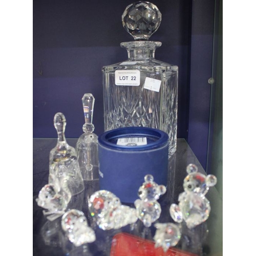22 - Seven 1980s crystal animals (one boxed), a decanter and two bells