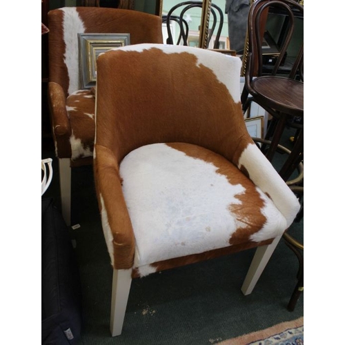 40 - A pair of animal hide covered occasional chairs.
