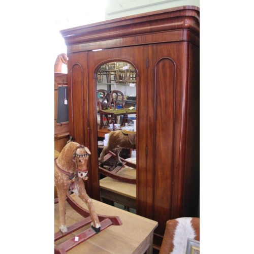 41 - A 19th century mahogany wardrobe, single door with lined interior and drawer.