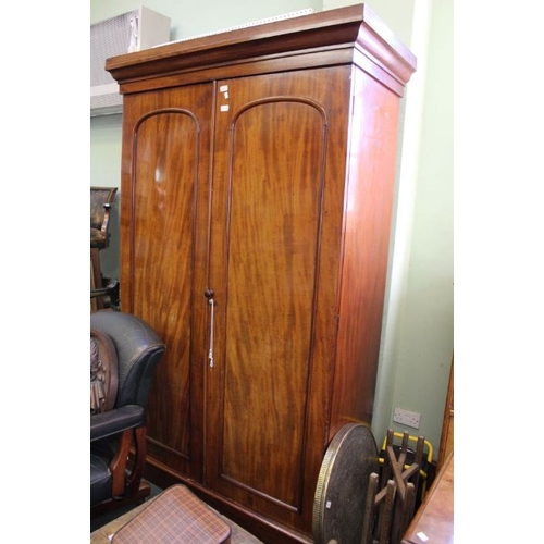 64 - A 19th century two door mahogany compactum.